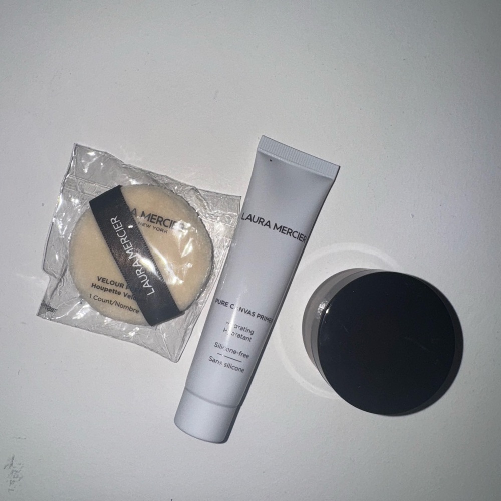 Laura Mercier mini primer, powder puffer, and translucent powder